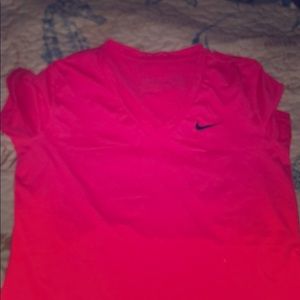 Bright pink nike dry fit shirt:)